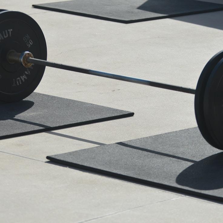 Women in a fitness class doing stretching and mobility exercises